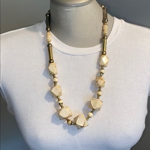 Vintage cream wood bead and brass necklace.